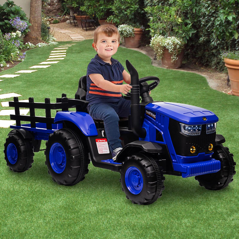 Les enfants électriques montent sur un tracteur avec une remorque, un véhicule alimenté par batterie 12V, Bleu
