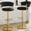 Tabouret de bar pivotant à 360° avec assise de 42 cm de large, hauteur réglable, revêtement en velours, structure en métal doré et repose-pieds.-1282993188