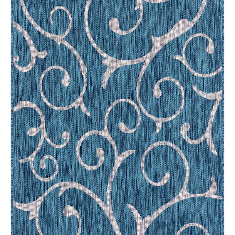 Tapis intérieur / extérieur bleu sarcelle en polypropylène tissé à la machine, Rectangle 4 pi 1 po x 6 pi 1 po
