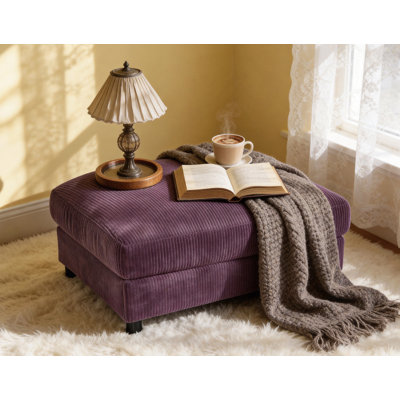 Repose-pieds rembourré en velours côtelé