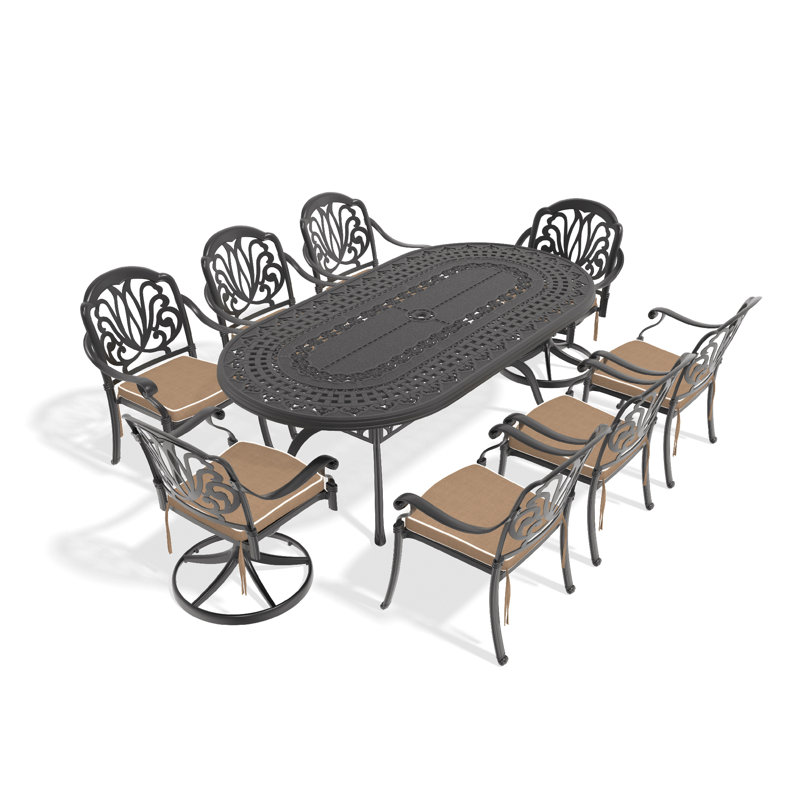 L'ensemble de salle à manger en aluminium coulé 9 pièces 9 pièces comprend 2 chaises pivotantes, 6 chaises et une table ovale avec cadre noir