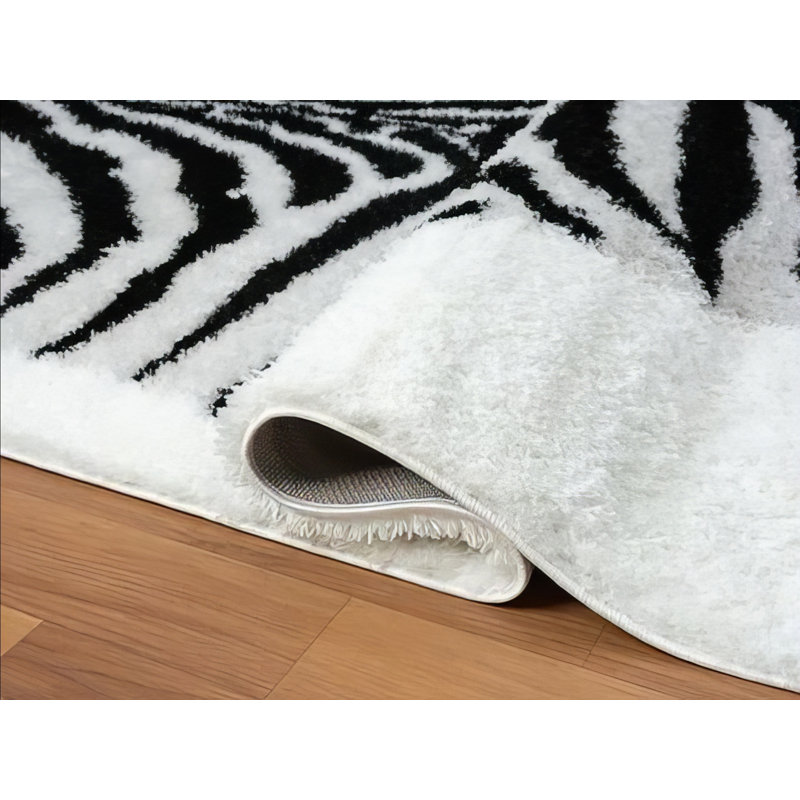 Rectangle 5 pi x 7 pi en synthétique noir / blanc Claybon Sheepskin