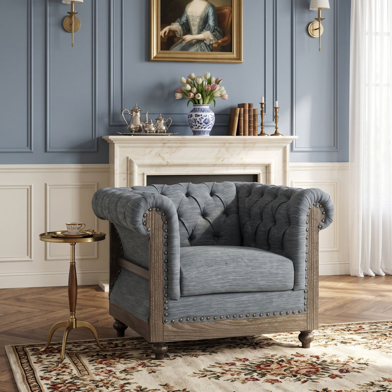 Fauteuil club capitonné