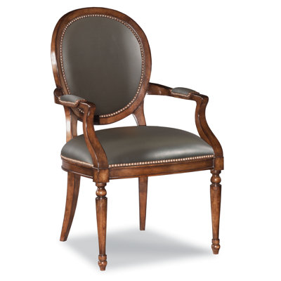 Chaise avec accoudoirs rembourrée en brun
