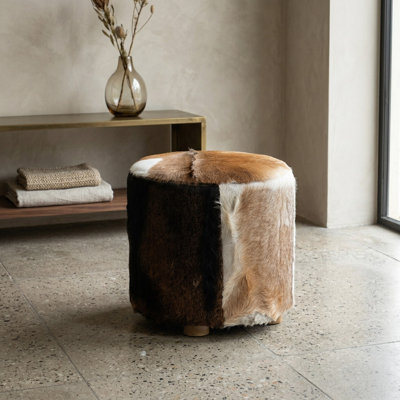 Repose-pieds en cuir de vache Conover Glam