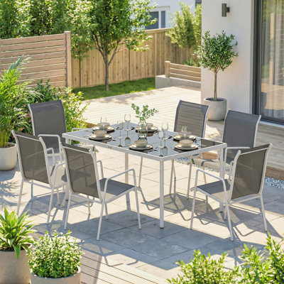 Ensemble de salle à manger de jardin 7 pièces avec 6 chaises empilables, gris