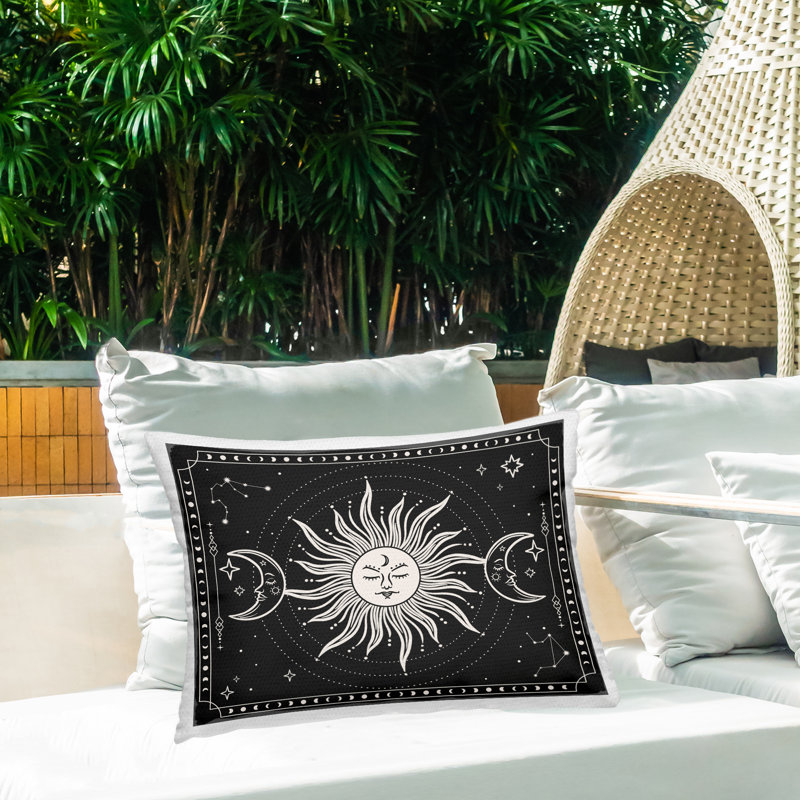 Coussin d'extérieur imprimé motif astral soleil et lune par JJ Design House LLC