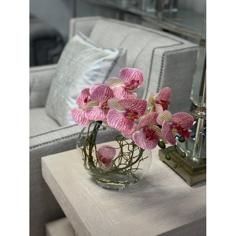 https://assets.wfcdn.com/im/71550258/resize-h755-w755%5Ecompr-r85/1754/175494845/Orchid+Arrangement+in+Vase.jpg