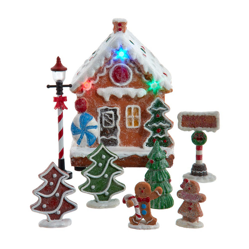 Cet ensemble de maison en pain d'épices à DEL multicolore à piles de Kurt Adler