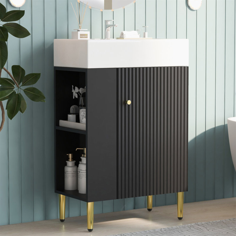 Meuble-lavabo noir élégant de 21,6 po avec lavabo en céramique et rangement spacieux sur le côté gauche, portes à fermeture en douceur et panneau de fibres à densité moyenne durable