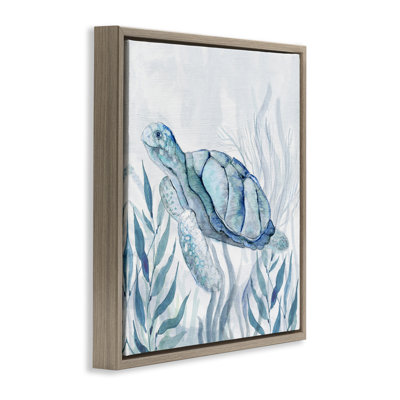 Tortue de mer avec cadre flottant au sourire subtil, design par Janet Tava