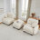 Canapé modulaire confortable à 2 places en tissu de chenille plissé avec siège ergonomique en mousse haute densité, canapé modulaire en forme de L avec repose-pieds, accoudoirs arrondis arrondis et 2 coussins décoratifs ronds, beige