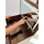 Coiffeuse compacte en noyer avec un design moderne et des options de rangement pratiques et élégantes-131299538