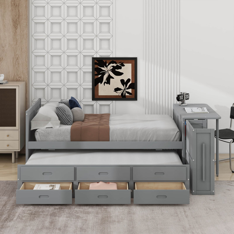 Lit plateforme simple en bois multifonctionnel avec bureau et tablette de rangement au bout du lit, lit gigogne intégré et 3 tiroirs