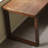 A simple rectangular solid wood desk in walnut color-2030258268