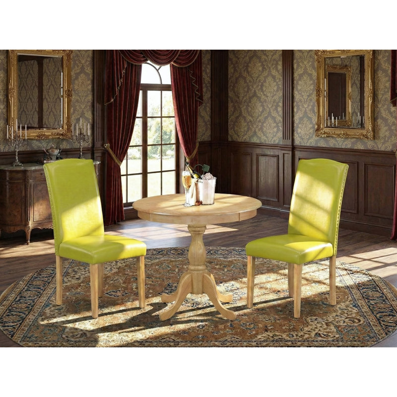 3 Piece Wooden Dining Table Set Contains 1 Round Pedestal Table and 2 Autumn Green PU faux Leather Parsons Chair High Back with Nail Heads - Oak Finish