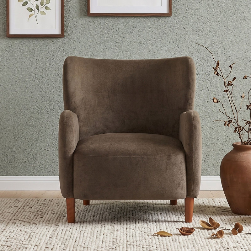 Fauteuil club à oreilles rembourré avec accoudoirs et pieds en bois