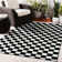 Tapis noir à motif géométrique Carpenter