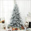 Arbre de Noël artificiel enneigé avec neige-767702233