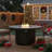 Dobbs 48" Round Fire Pit Table 40,000 BTU Carbon Steel Construction Adjustable Feet Magnetic Gas Door