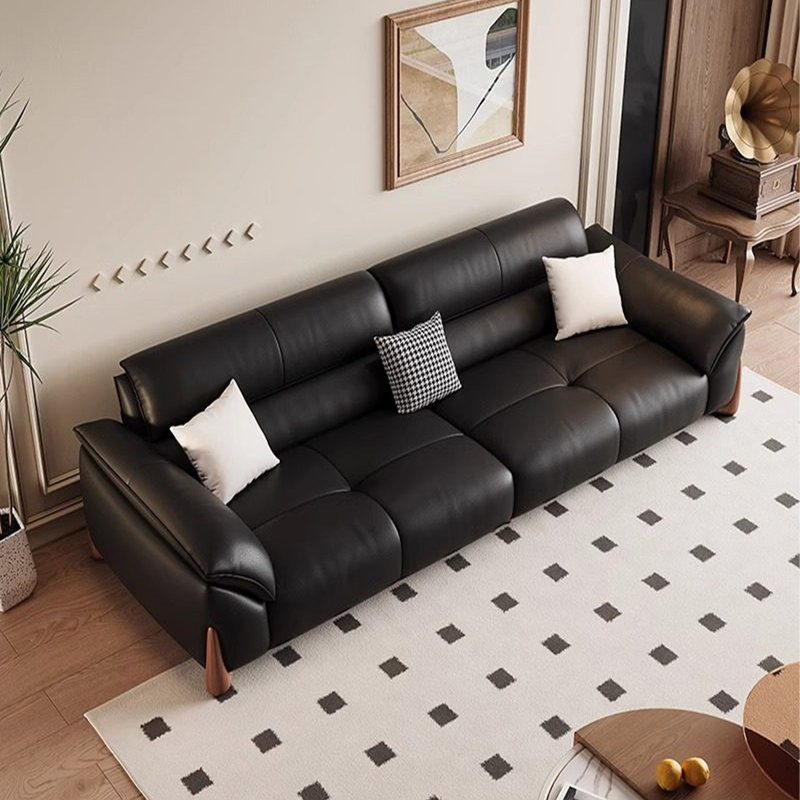 Causeuse-coussin modulable noire en cuir véritable