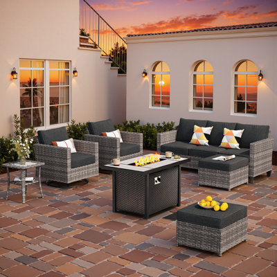 Outdoor Wicker 7 Person Seating Group With Swivel Rocking Armchairs And Fire Pit Table by Lark Manor