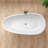 Fiume 66.875'' x 33.375'' Soaking Stone Bathtub