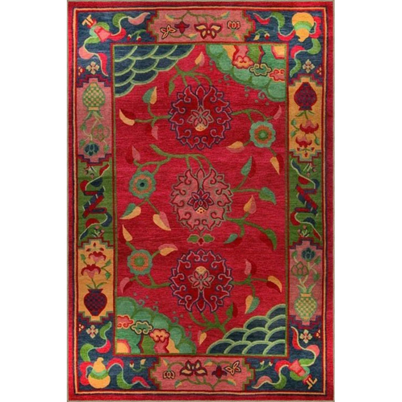 Tapis tissé avec motifs floraux dans les tons de rouge, Rond 4 pi