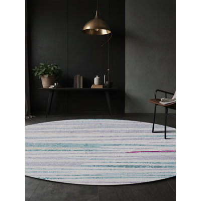 Tapis gris soyeux et moelleux