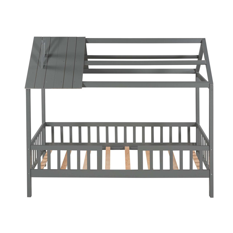 Lit en bois avec clôture