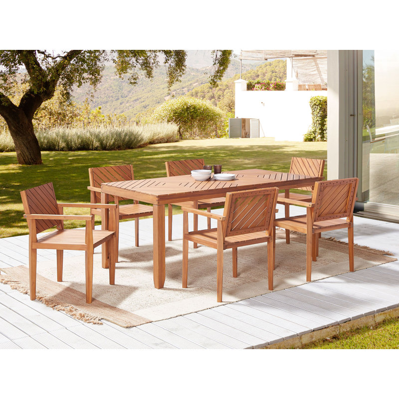 Nuncio 6 - Person Acacia Solid Wood Patio Dining Set Rectangular Table