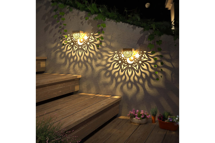 wall-mounted landscape lights above wooden patio steps