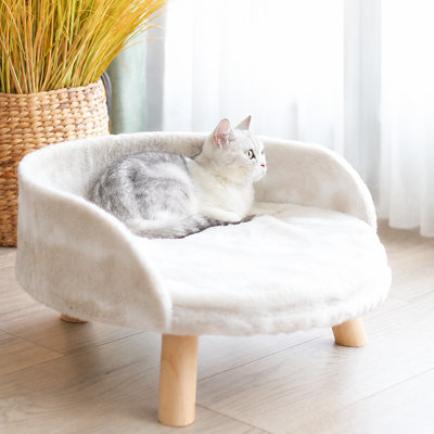 Canapé surélevé en peluche pour animaux de compagnie avec pieds en bois massif - canapé semi-circulaire pour chat et chien avec coussin lavable amovible, pieds antidérapants, pour petits et moyens animaux de compagnie (13,8 po / 19,7 po, beige)
