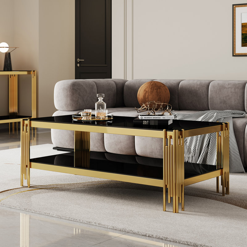 Élégante table basse en verre trempé avec structure en acier inoxydable noir et doré et double couche durable facile à nettoyer
