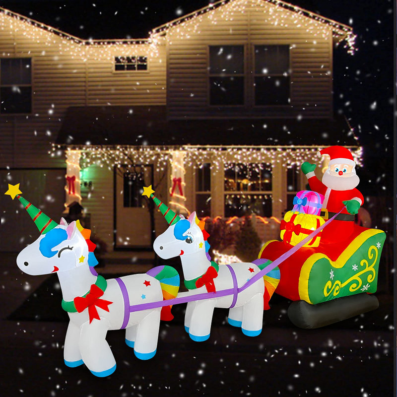 Père Noël gonflable en traîneau