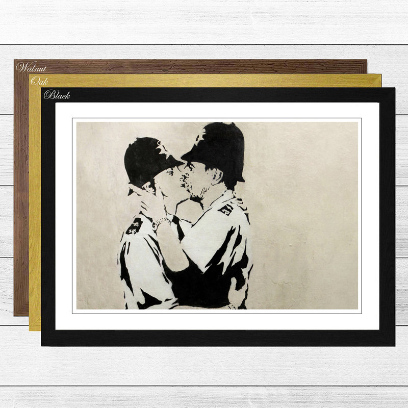 Kissing Police Policeman Graffiti by Banksy - Framed Print, Black