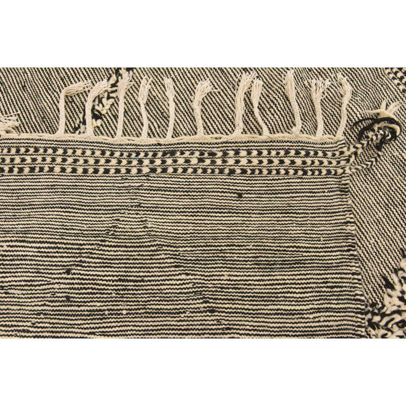 Tapis noir et blanc Mosser