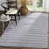 Tapis rayé en coton tissé à la main Melaina