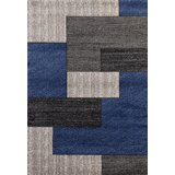 Tapis décoratif bleu fait à la main à motif géométrique