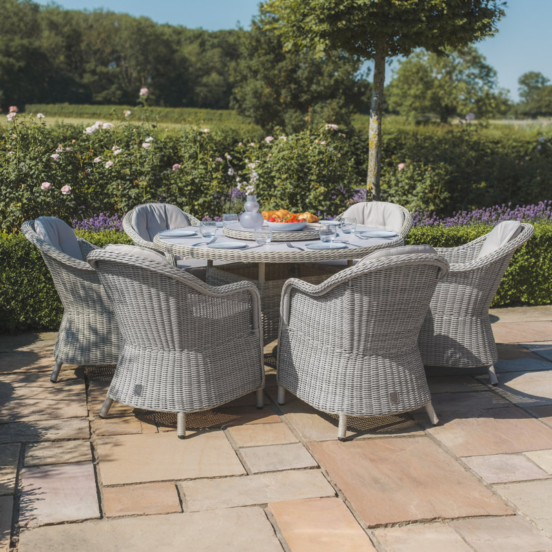 Anissah 6 - Person Patio Dining Set with Round Table