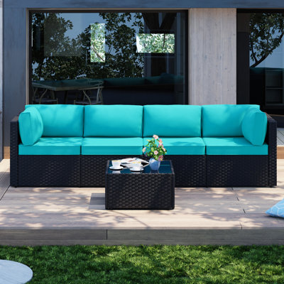 Seville 4 - Person Outdoor Wicker Patio Set with Cushions