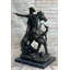 Statue de bronze d'un cowboy de l'Ouest
