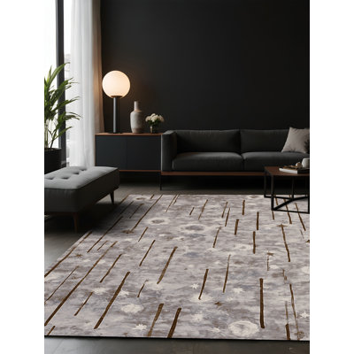 Tapis gris soyeux et moelleux