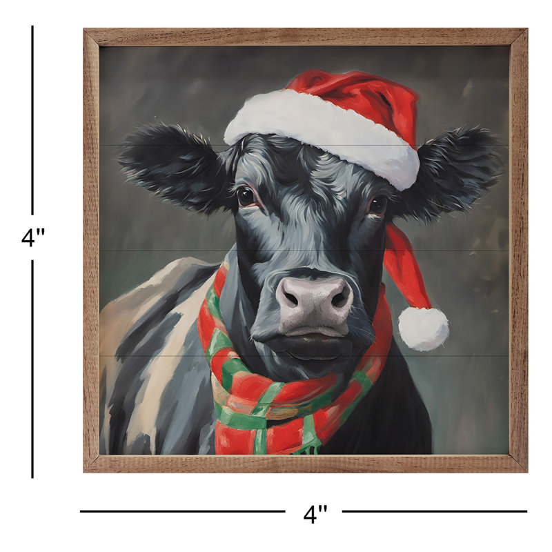 Vache du Père Noël avec chapeau et écharpe