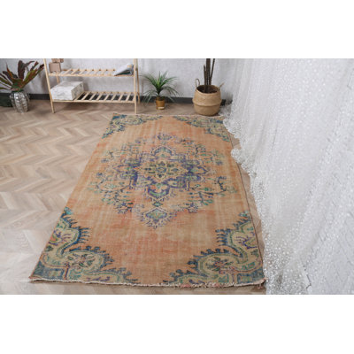 Tapis Oushak turc authentique au style vintage, d'un orange éclatant, idéal pour la décoration d'une chambre à coucher
