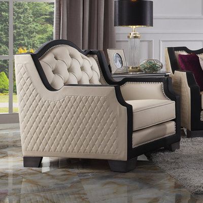 Fauteuil capitonné l 37 po Biskoupky