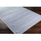 Eljah Solid Color Handmade Flatweave Denim Area Rug