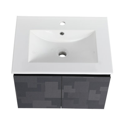 Meuble-lavabo flottant 24 po. Lavabo en céramique et porte à fermeture en douceur. Armoire moderne en contreplaqué noir. Lavabo mural. Armoire noire. Fixé. Gracieux