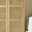 Armoire de rangement en bois et rotin à trois portes