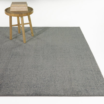 Tapis Battista bleu vieilli uni